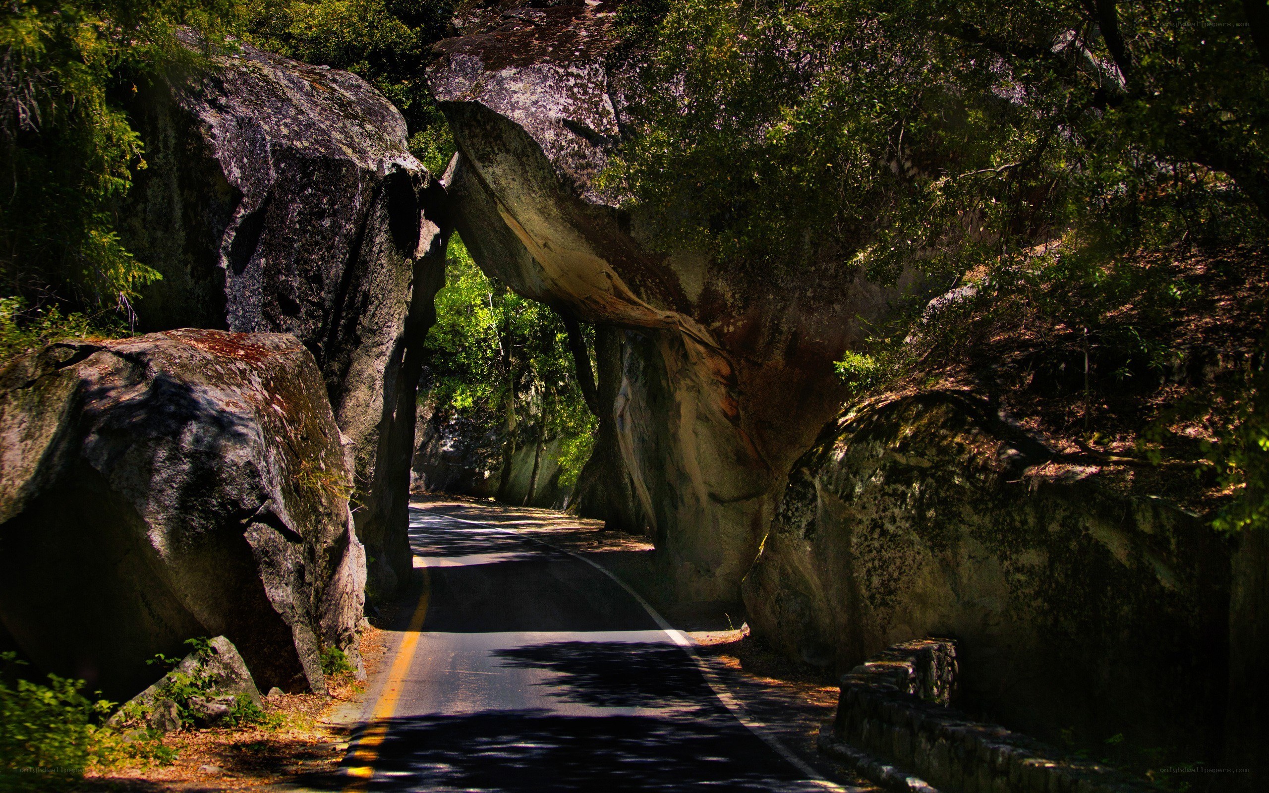 Road through natural rock arch