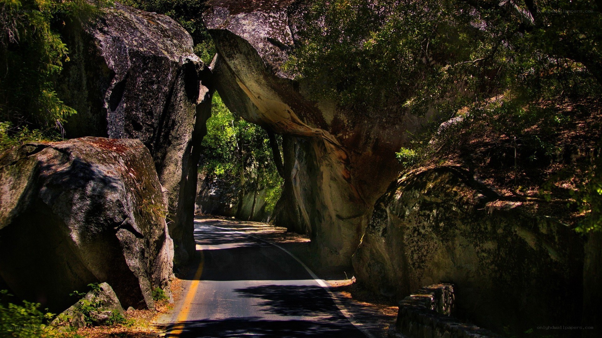 Road through natural rock arch