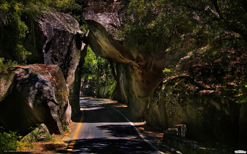 Road through natural rock arch