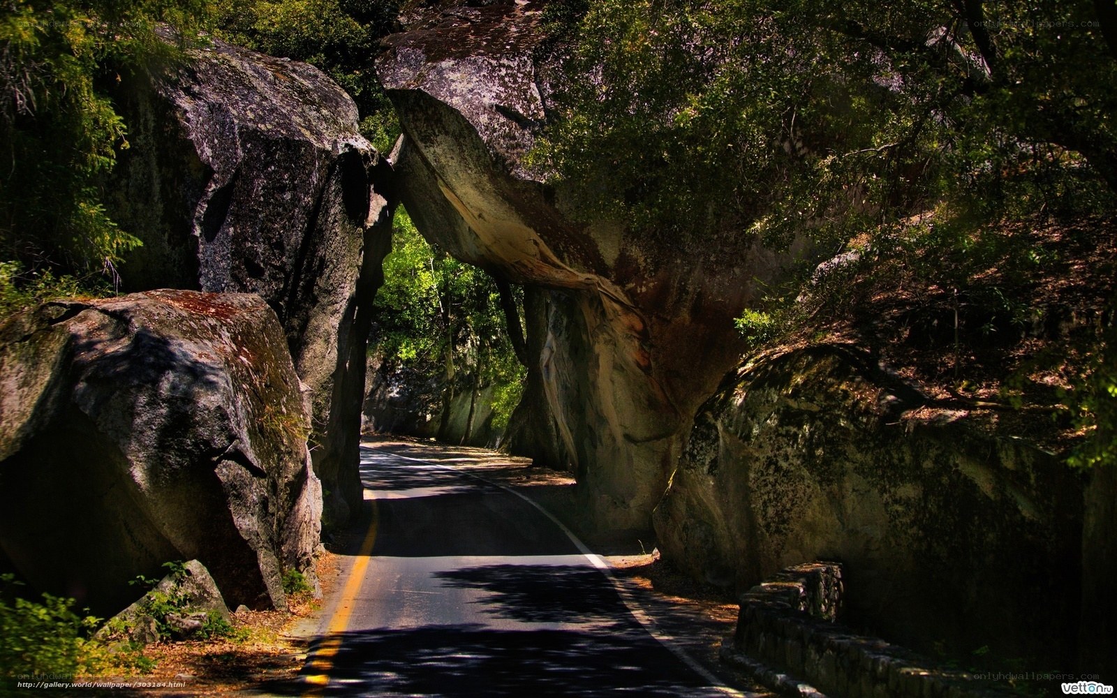 Road through natural rock arch