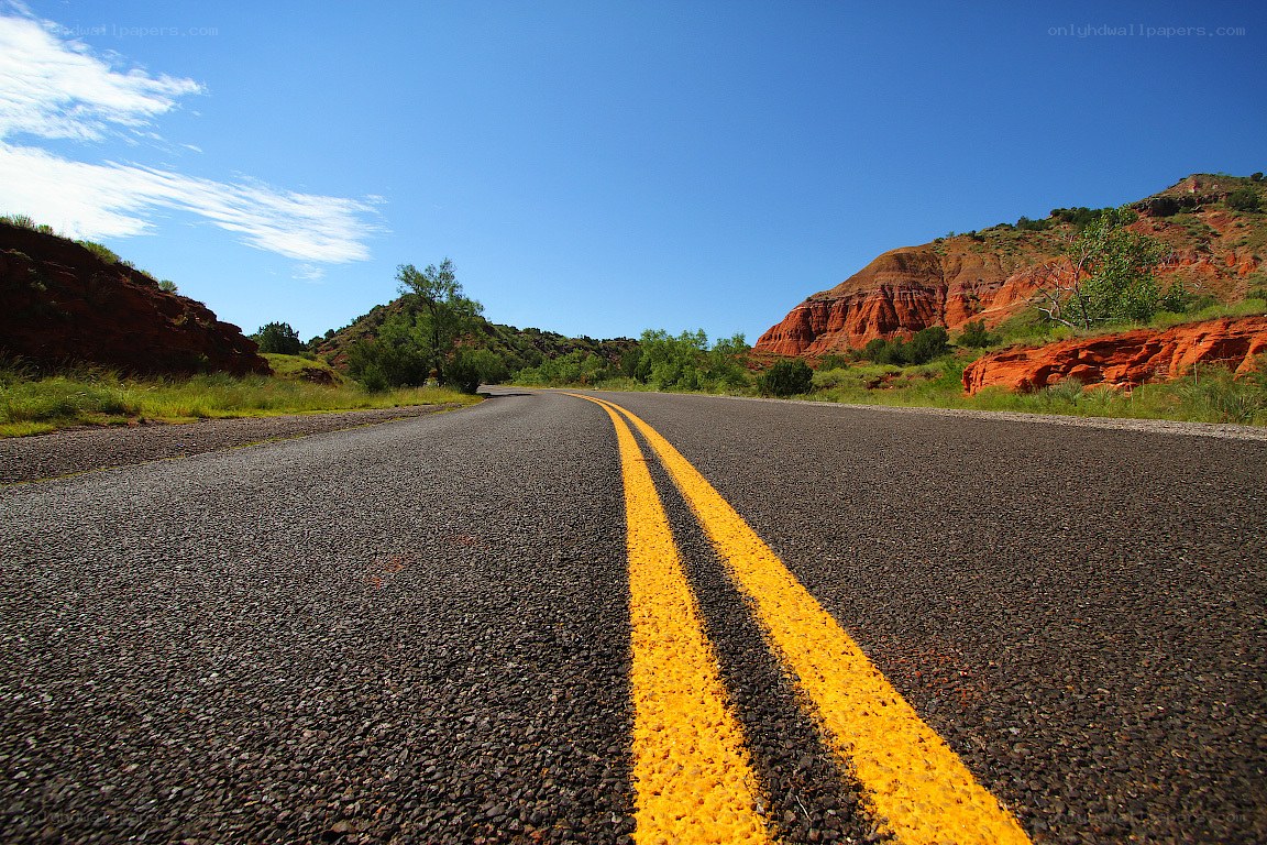 Road through red rock canyon