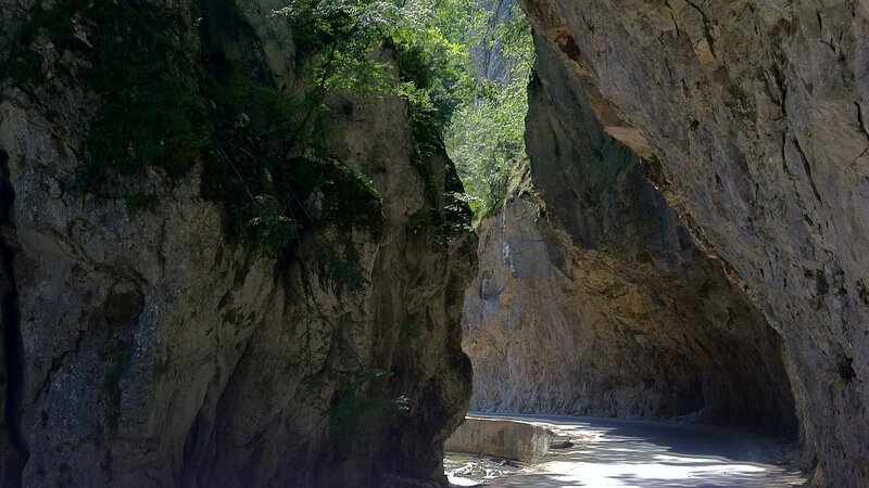 Road Through Rock Tunnel — Gray