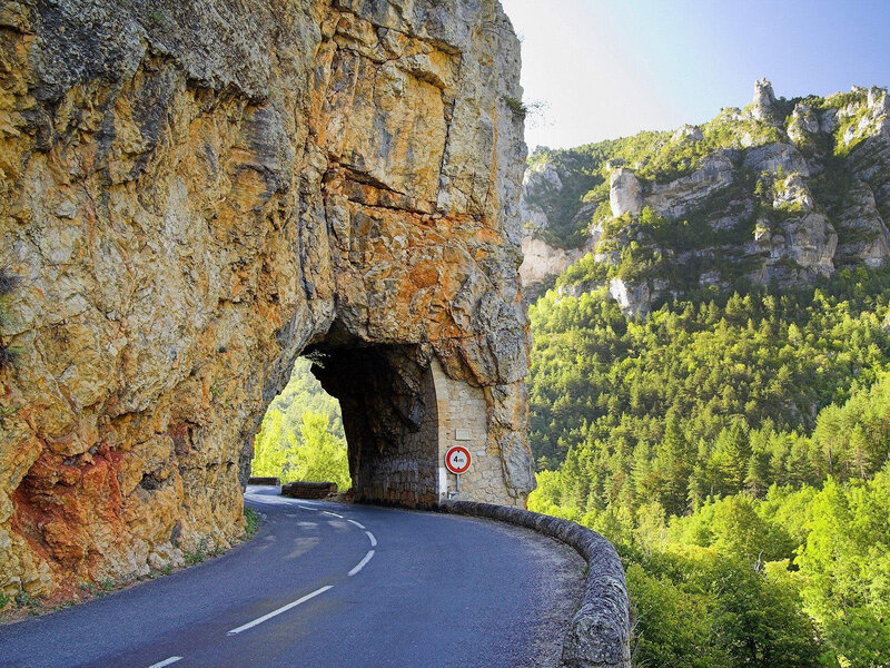 Road Through Rock Tunnel — Green