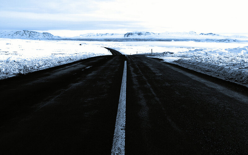 Road through snowy landscape
