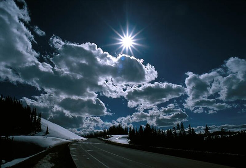Road Through Snowy Landscape — Blue, Dramatic