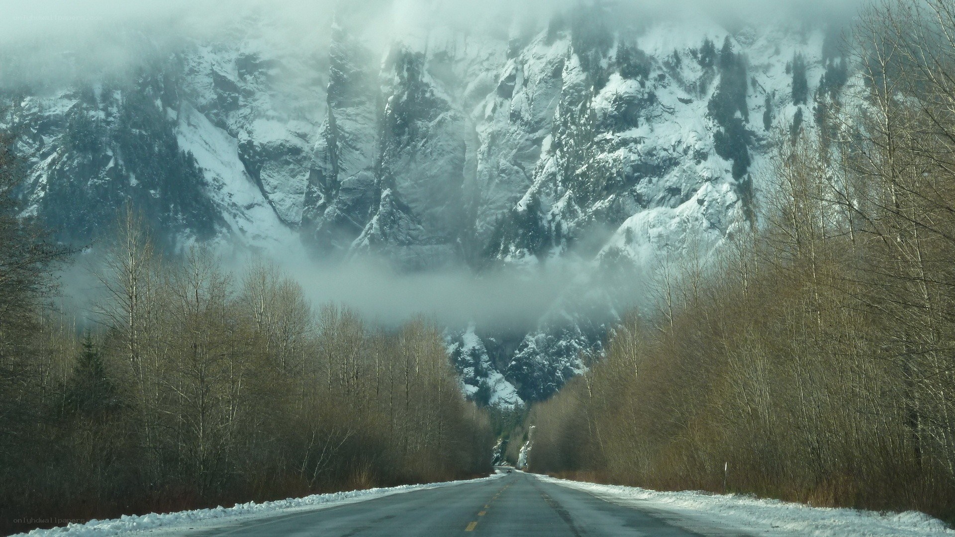 Road through snowy mountain pass
