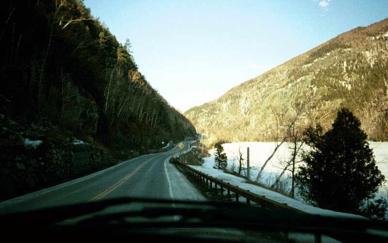 road through snowy mountain valley