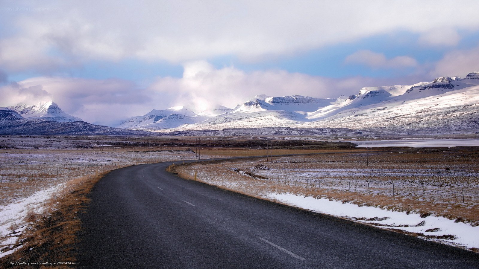 Road through snowy mountains