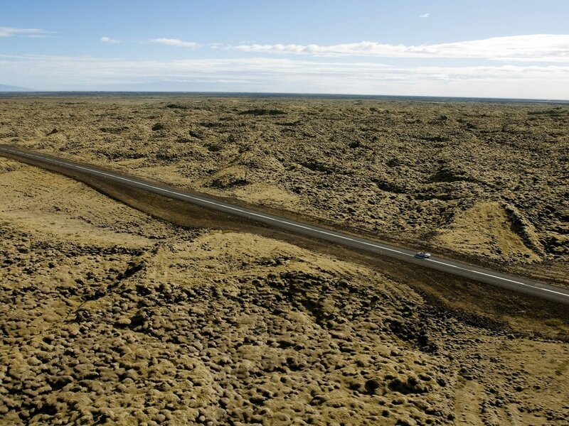 Road through volcanic landscape