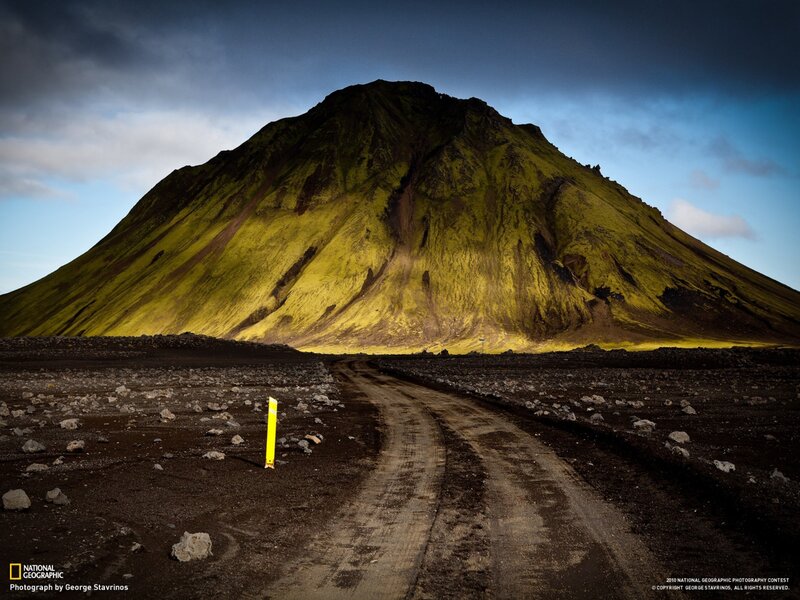 Road to a moss-covered mountain