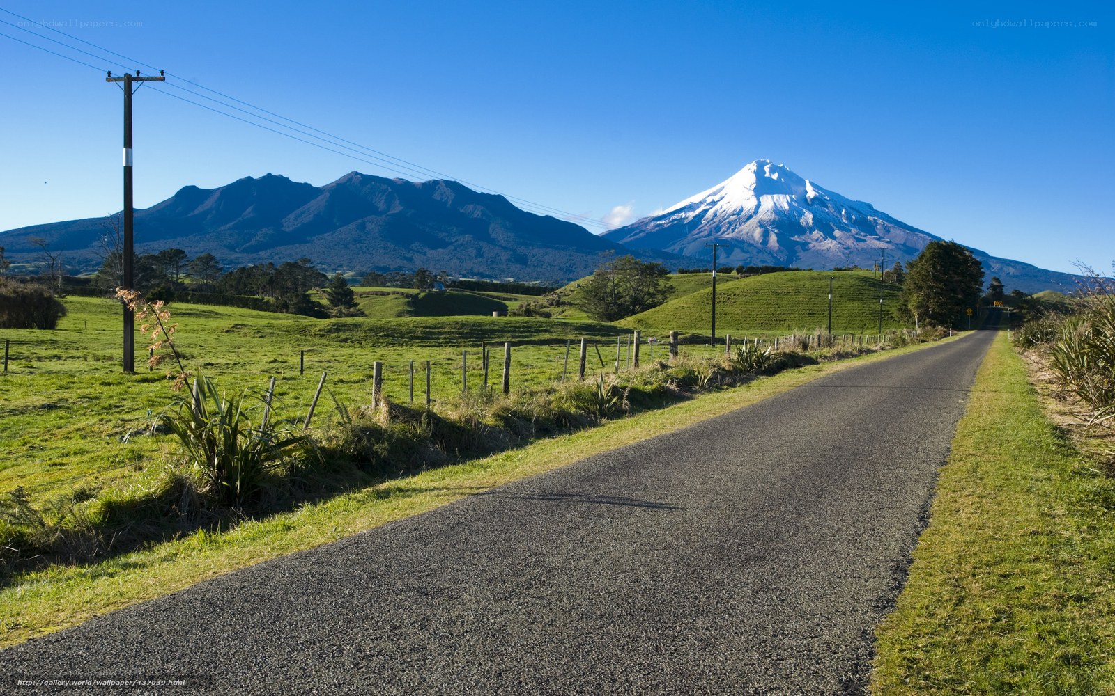 Road to a snow-capped mountain