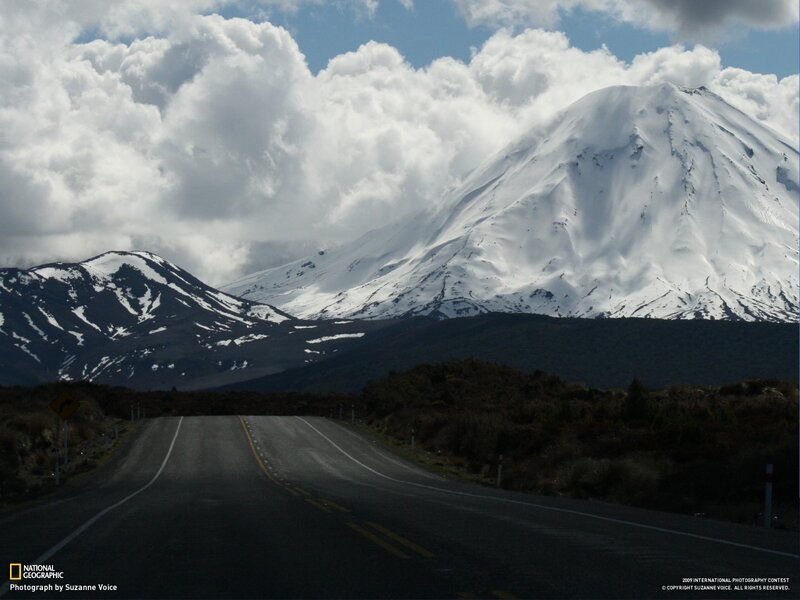 Road to a snow-capped mountain
