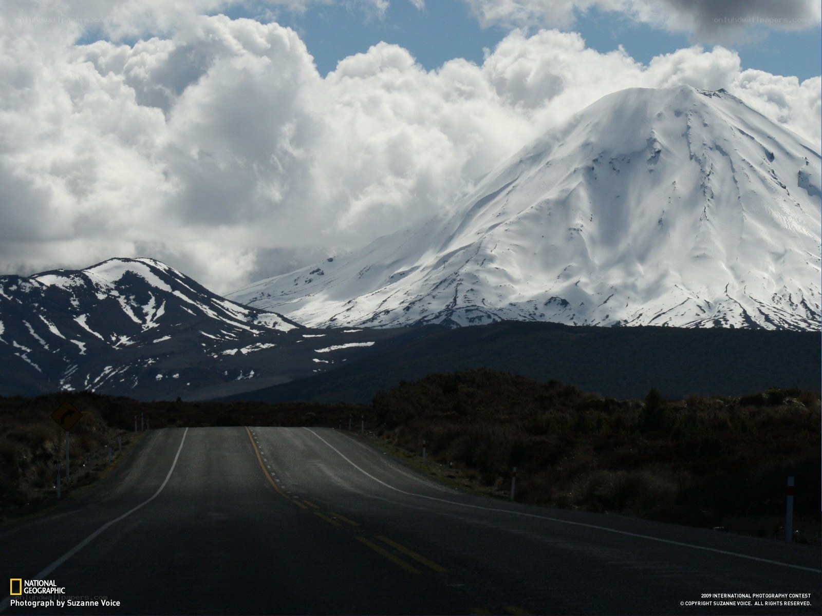 Road to a snow-capped mountain