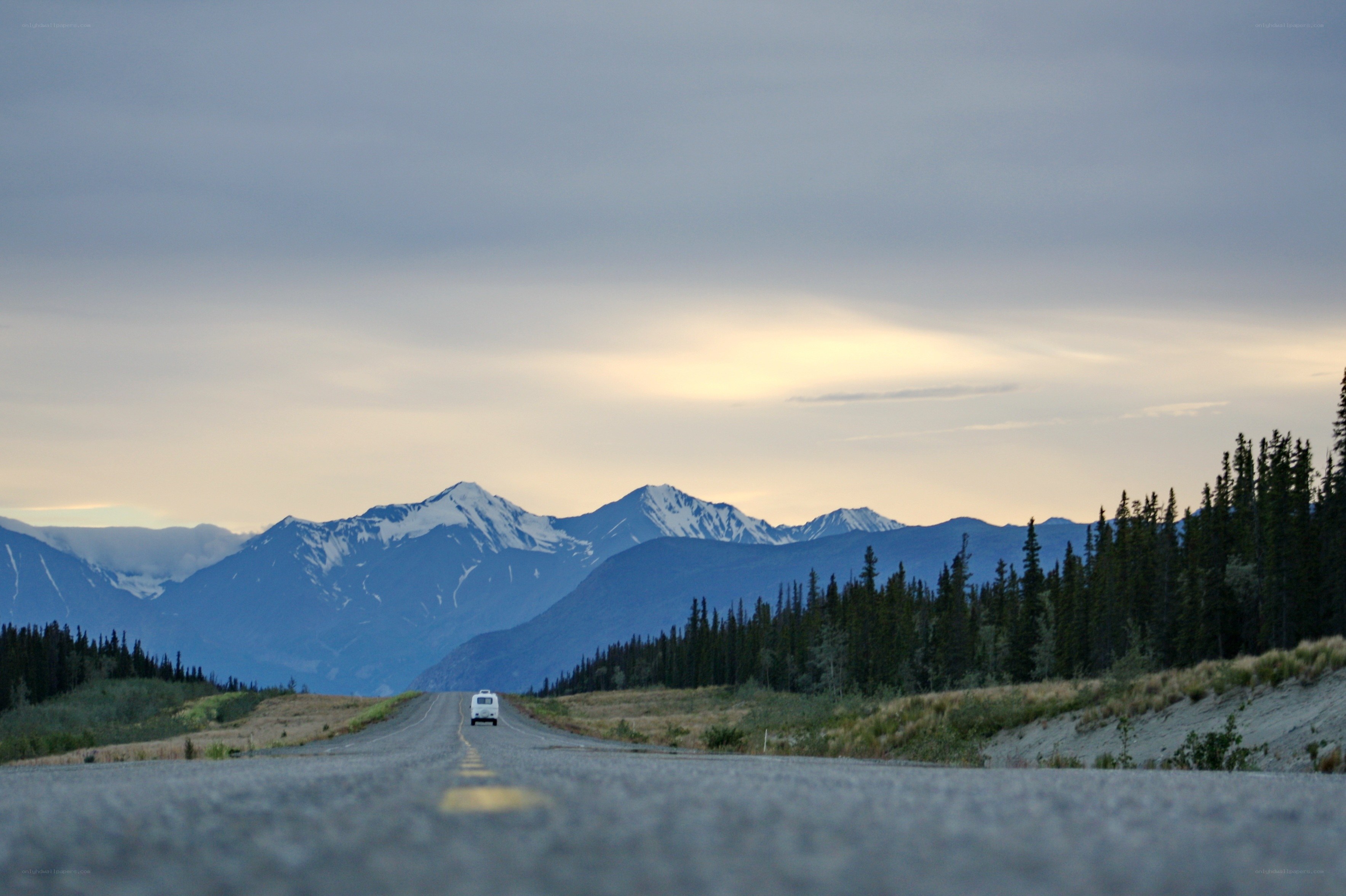 Road to snow-capped mountains