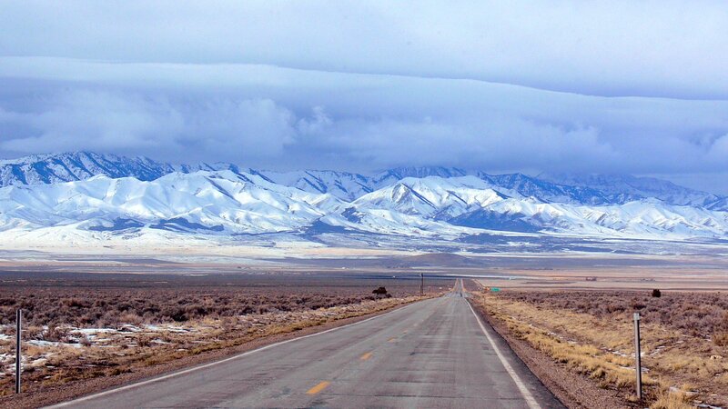 Road to snow-capped mountains