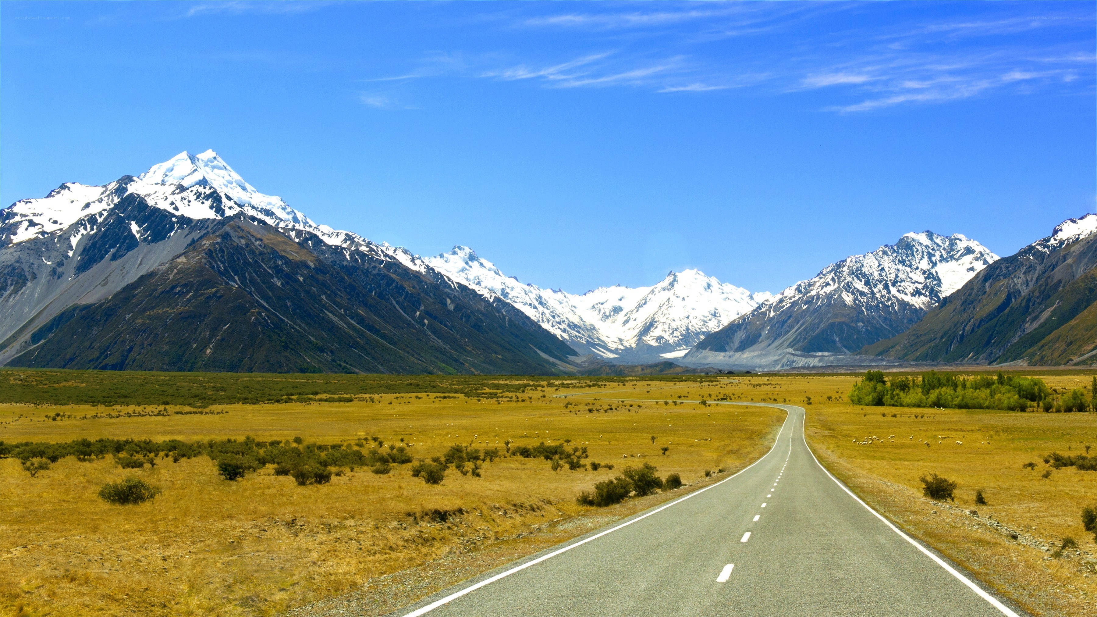 Road to snow-capped mountains