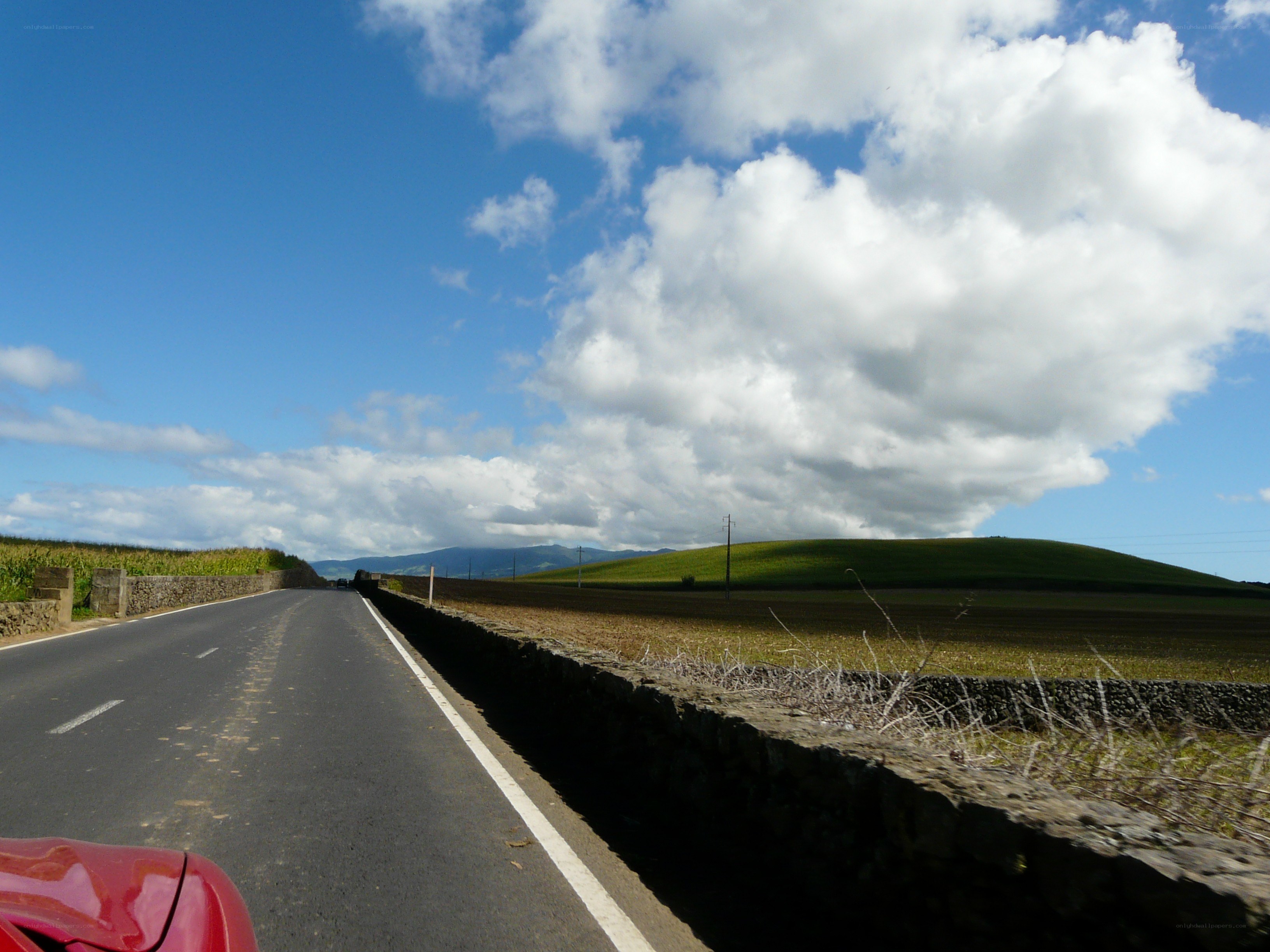 Road trip through green hills