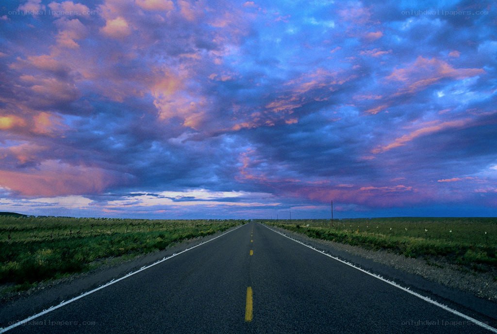 Road under a colorful sky