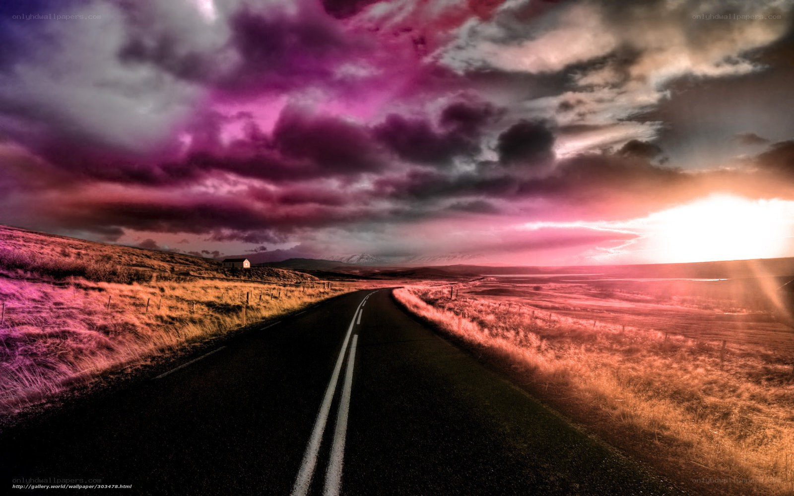 Road under purple sky