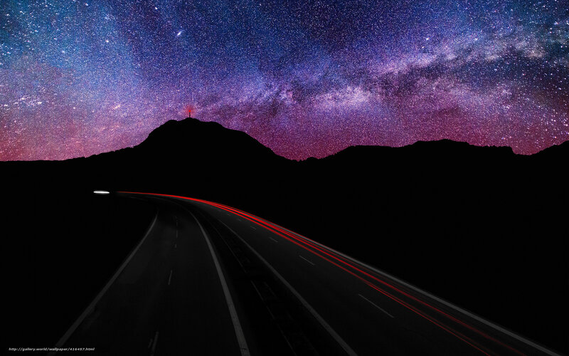 Road under starry sky