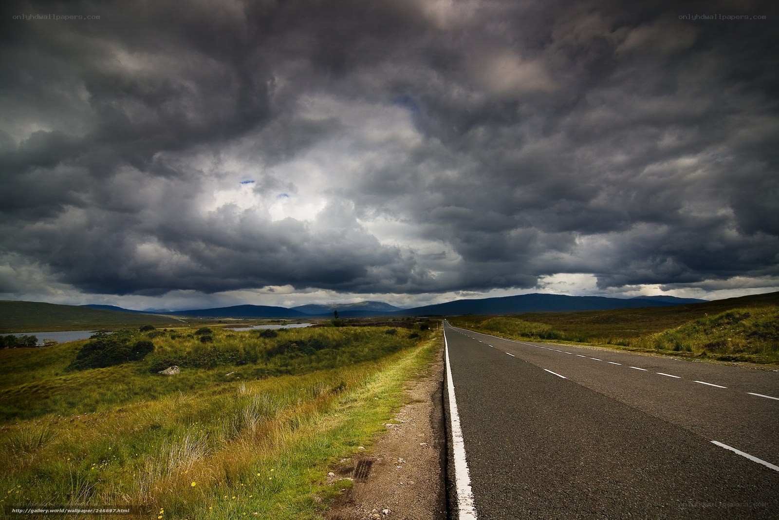 Road under stormy sky