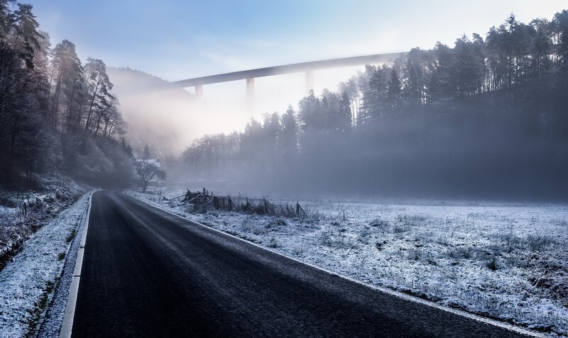 Road with Bridge in Fog