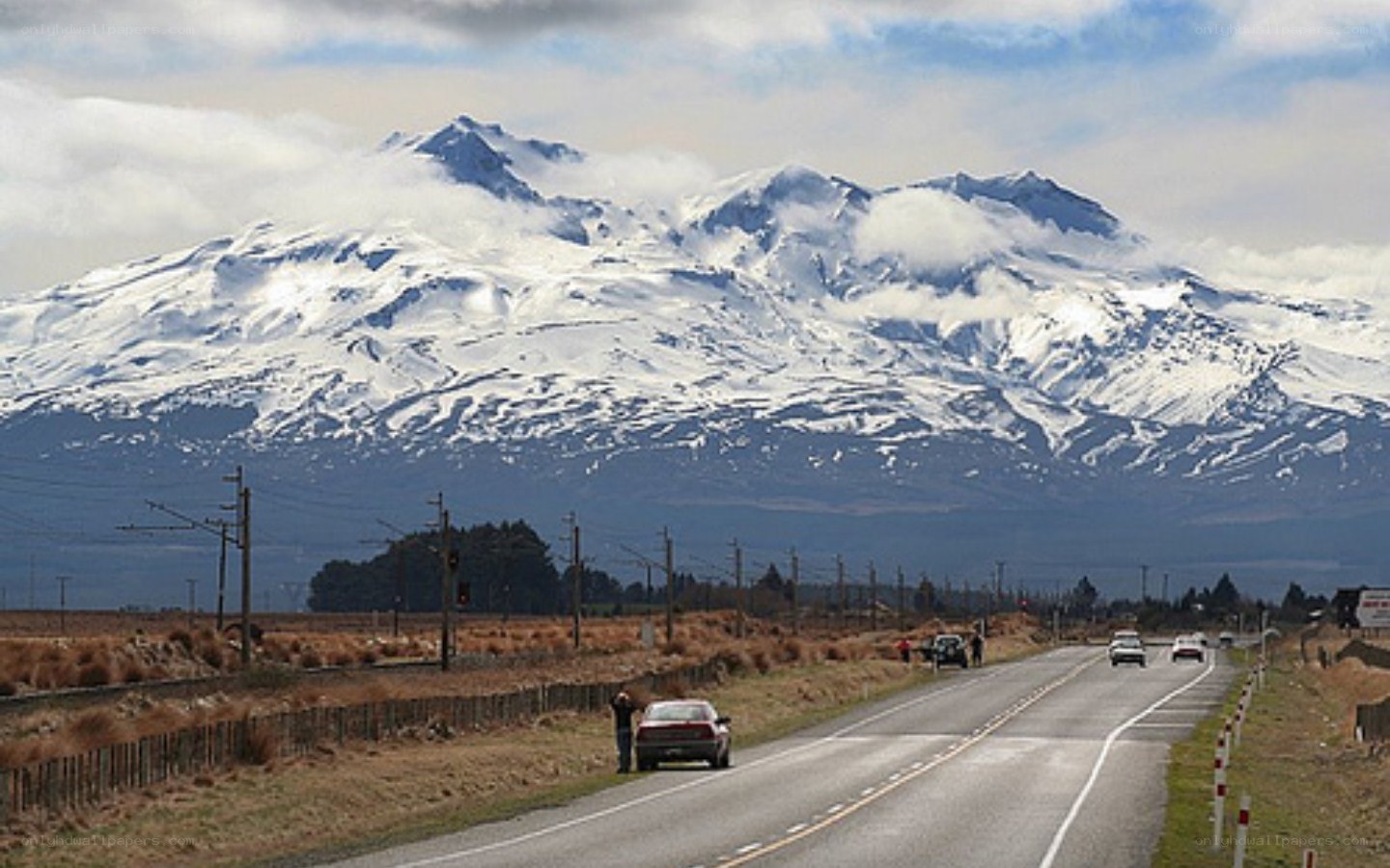 Road with snow-capped mountains
