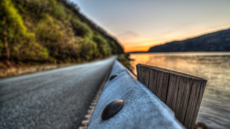 Roadside Guardrail at Sunset