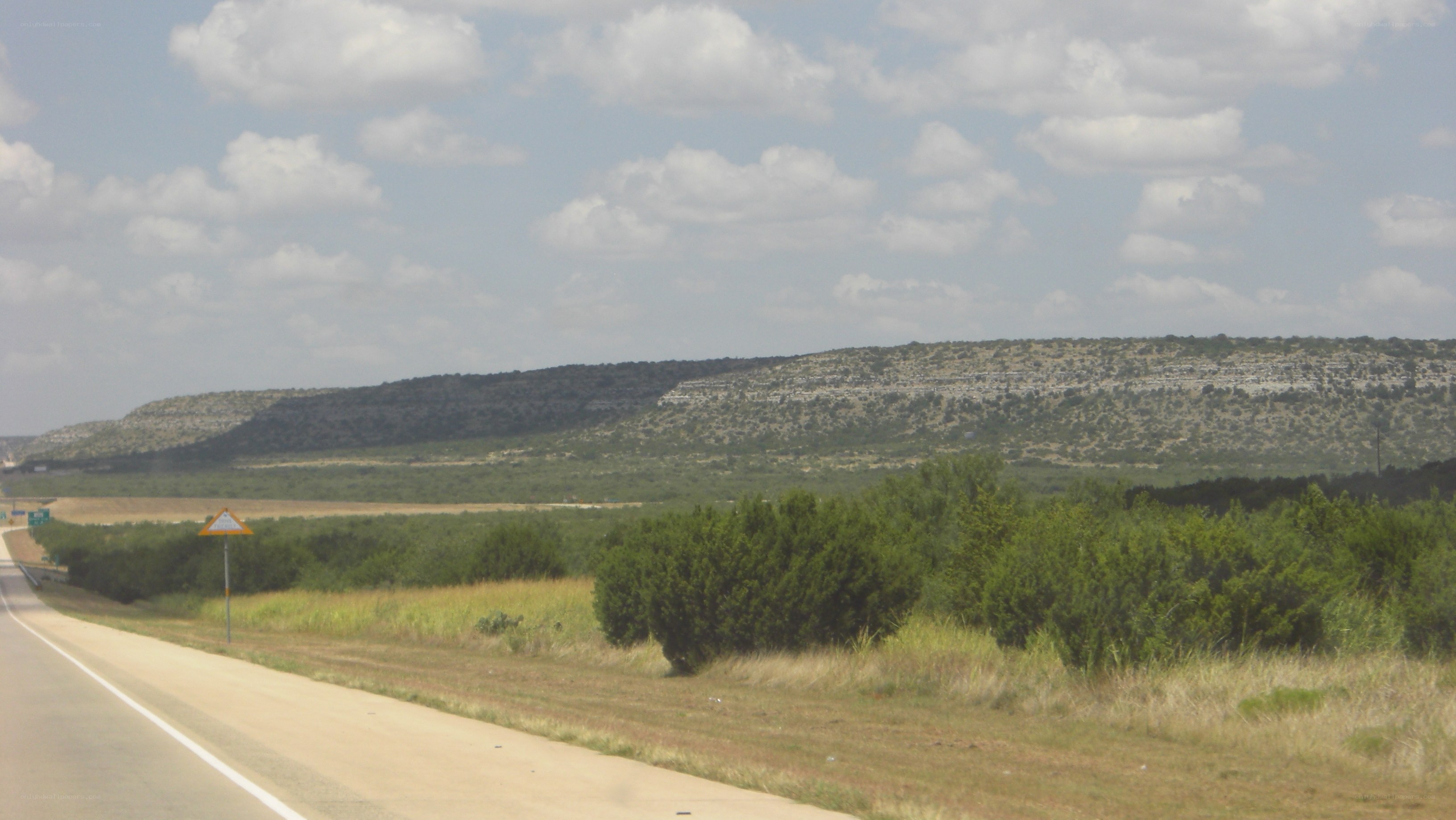 roadside landscape with hills