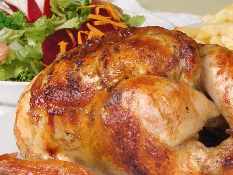 Roasted chicken with salad and fries