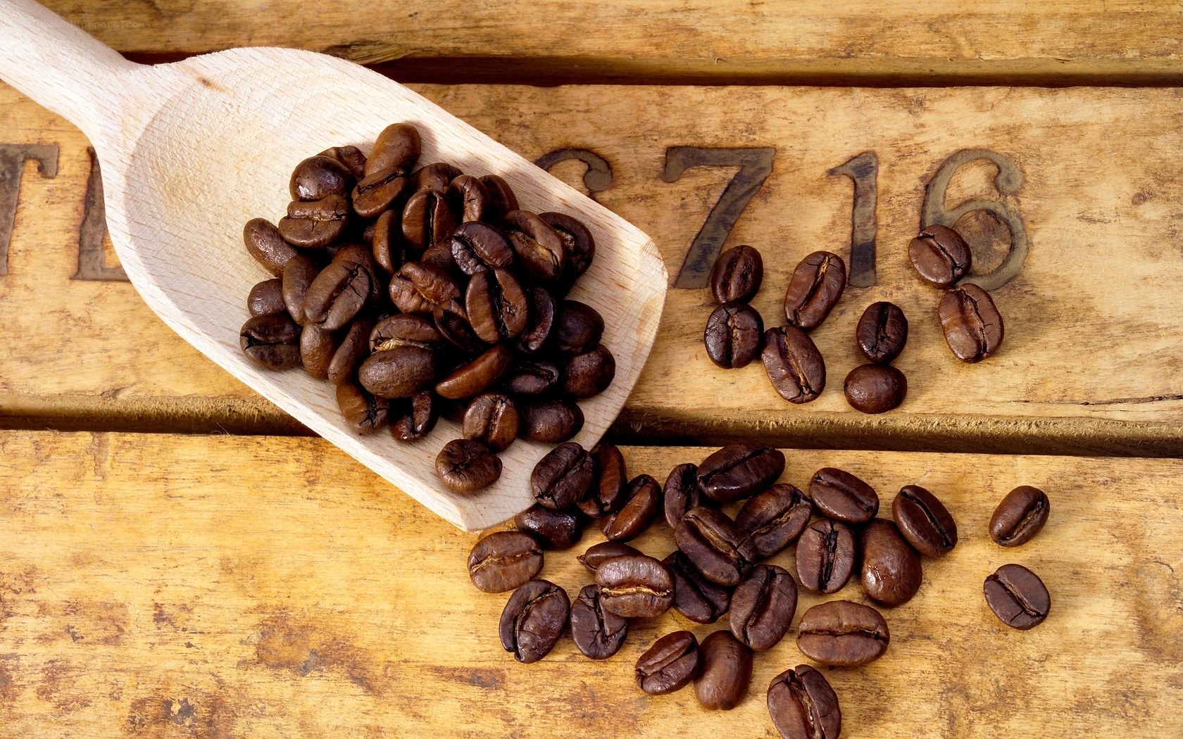 Roasted coffee beans on wood