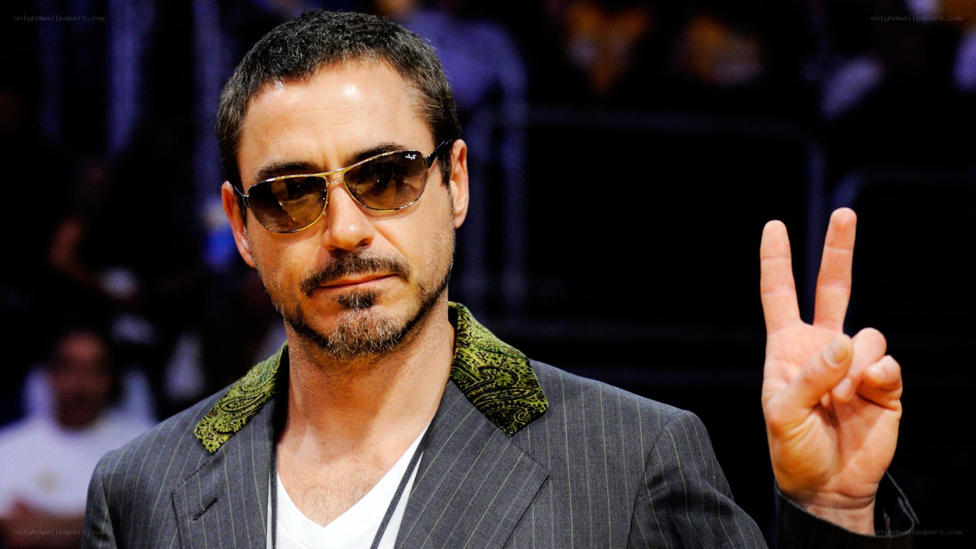 Robert Downey Jr. making peace sign