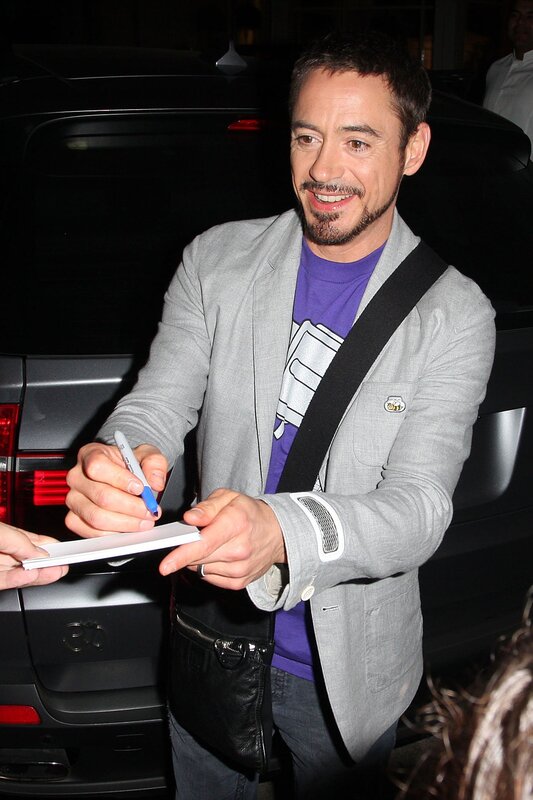 Robert Downey Jr. signing autograph