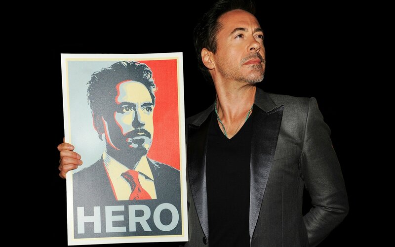 Robert Downey Jr. with hero poster