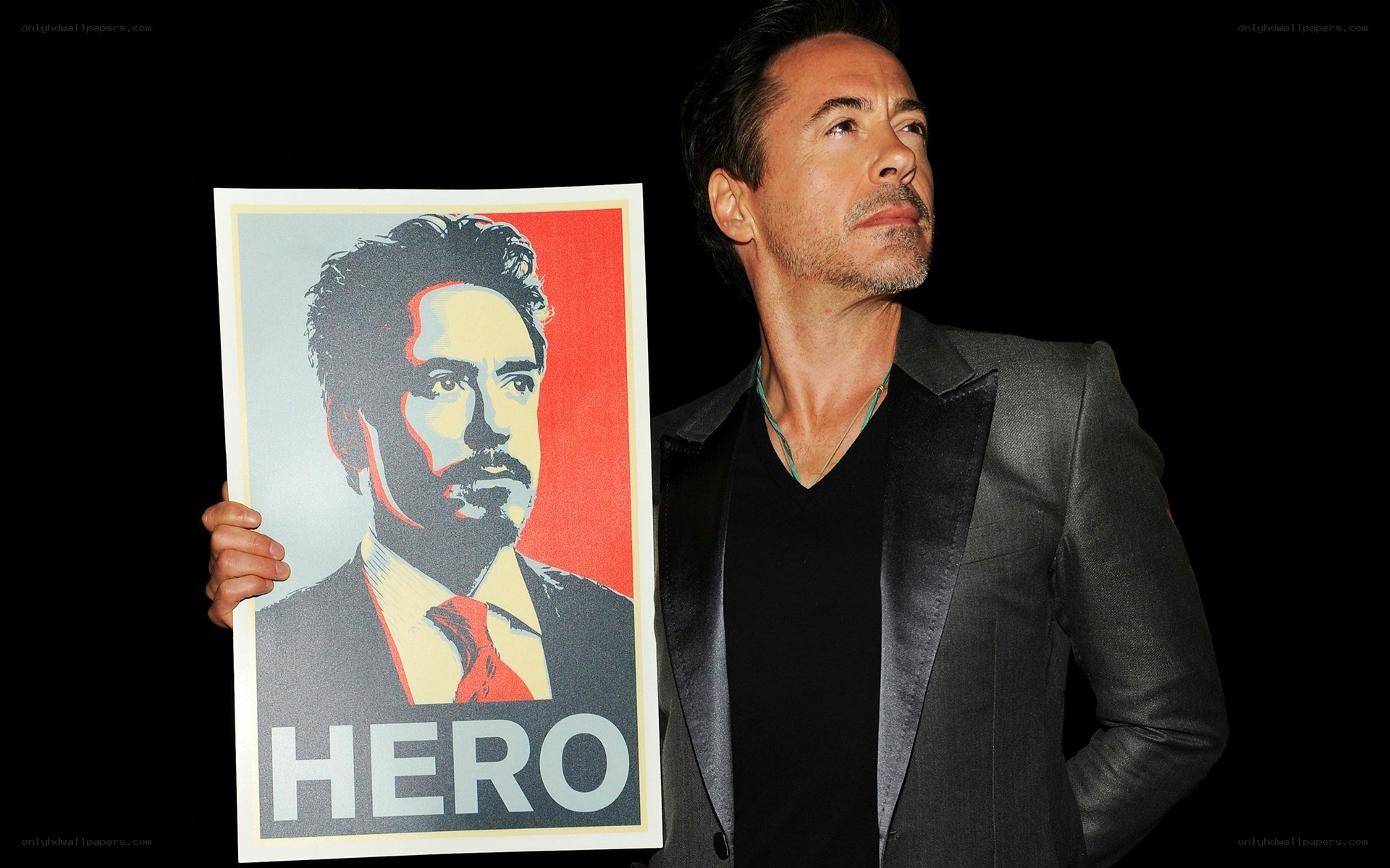 Robert Downey Jr. with hero poster
