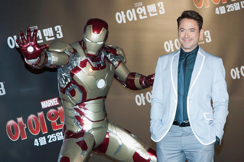 Robert Downey Jr. with Iron Man suit