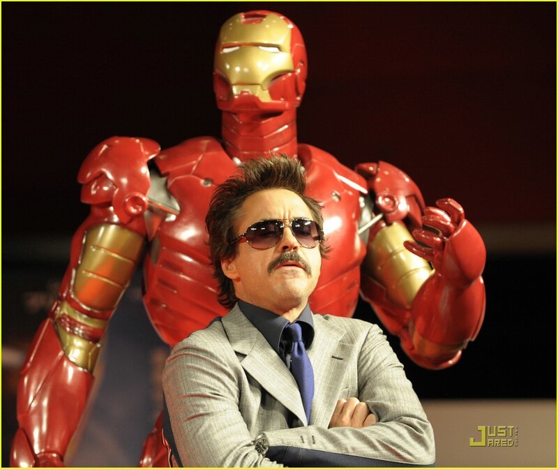 Robert Downey Jr. with Iron Man suit