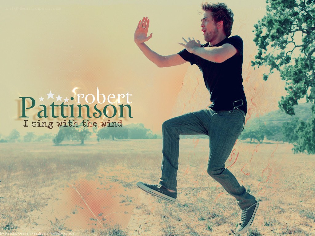 Robert Pattinson in a field