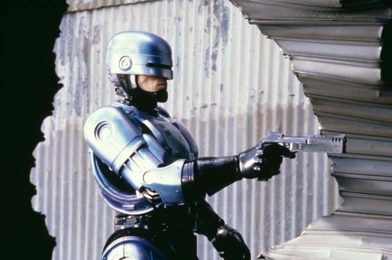 RoboCop aiming a gun