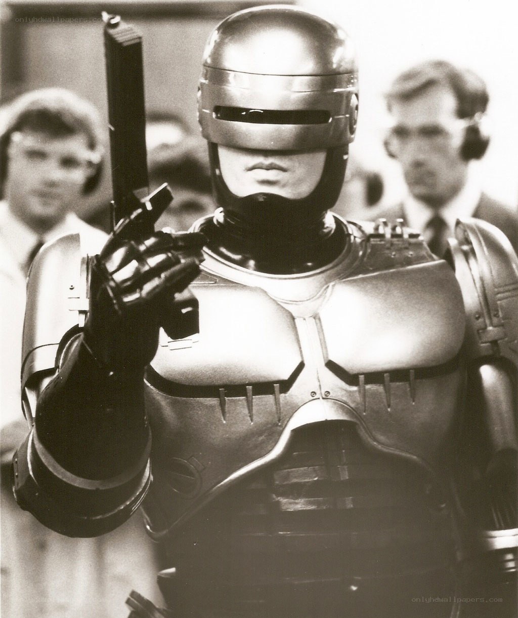 RoboCop holding a gun