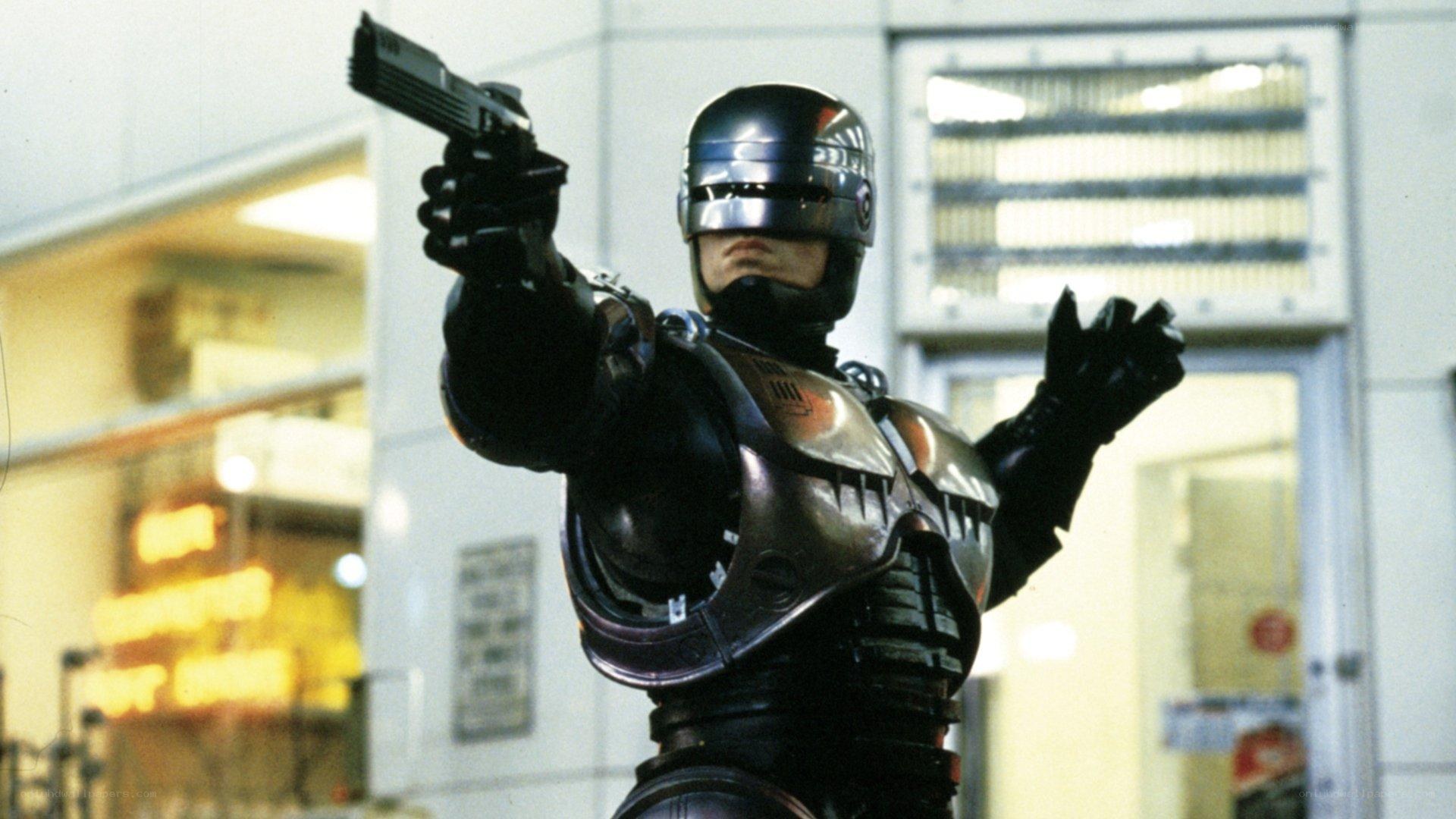 RoboCop holding a gun