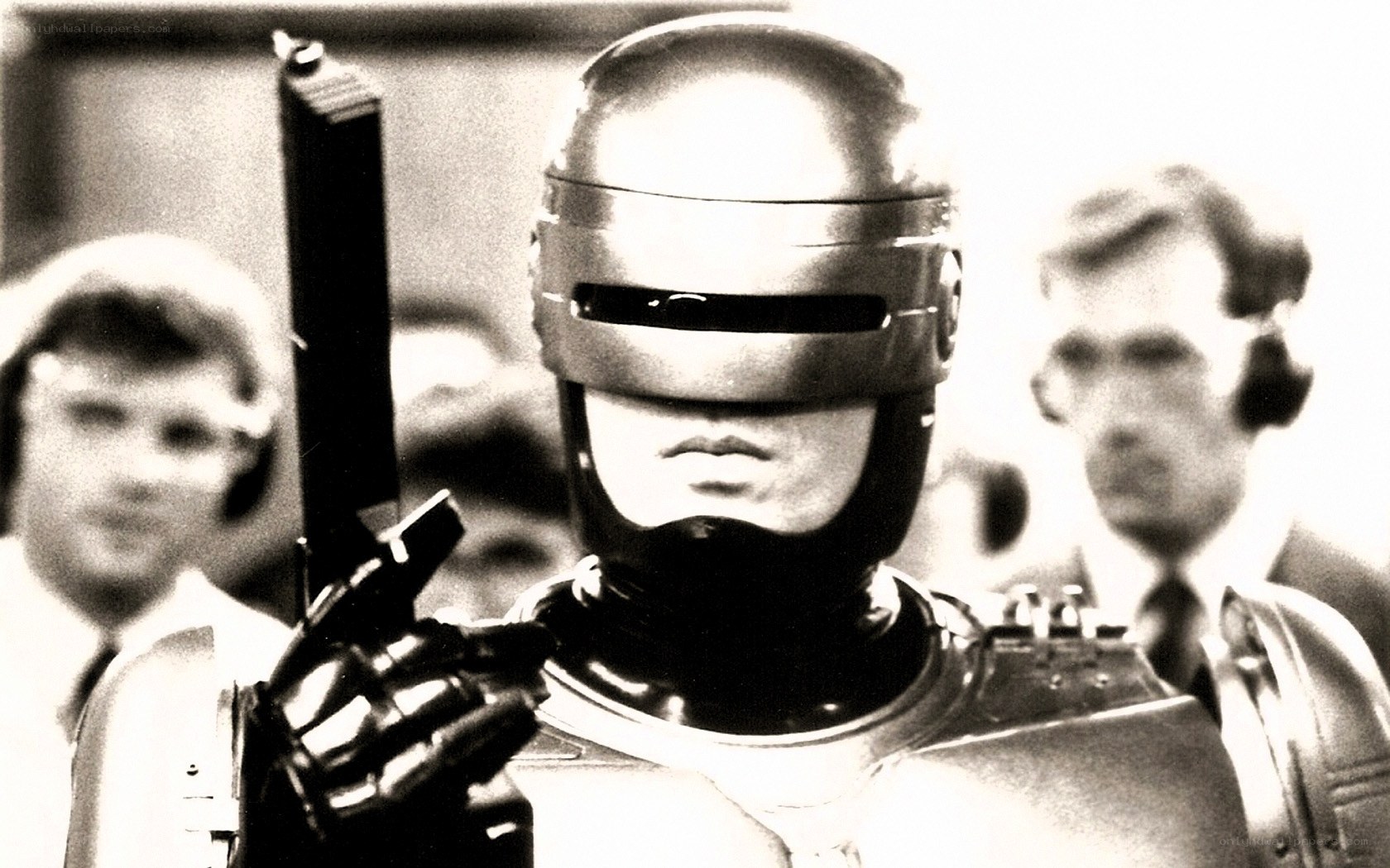 RoboCop holding a gun