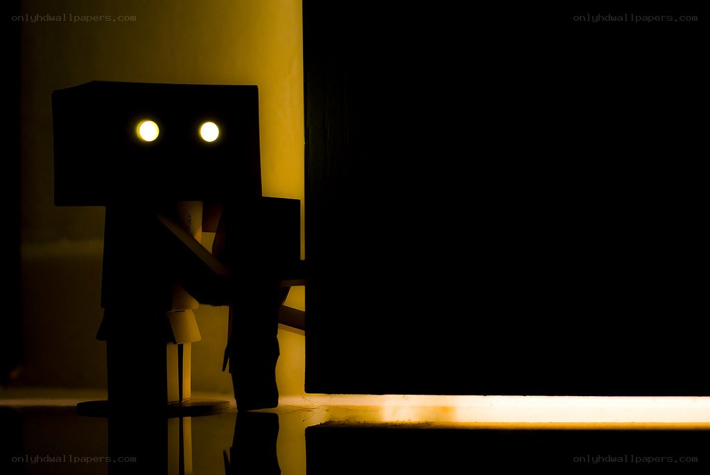 robot figure in dim light