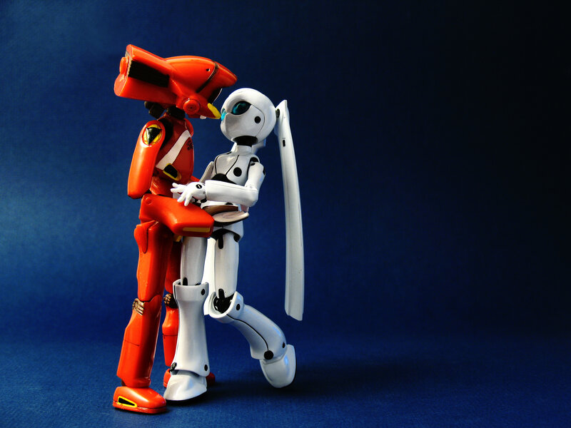 Robot figures embracing
