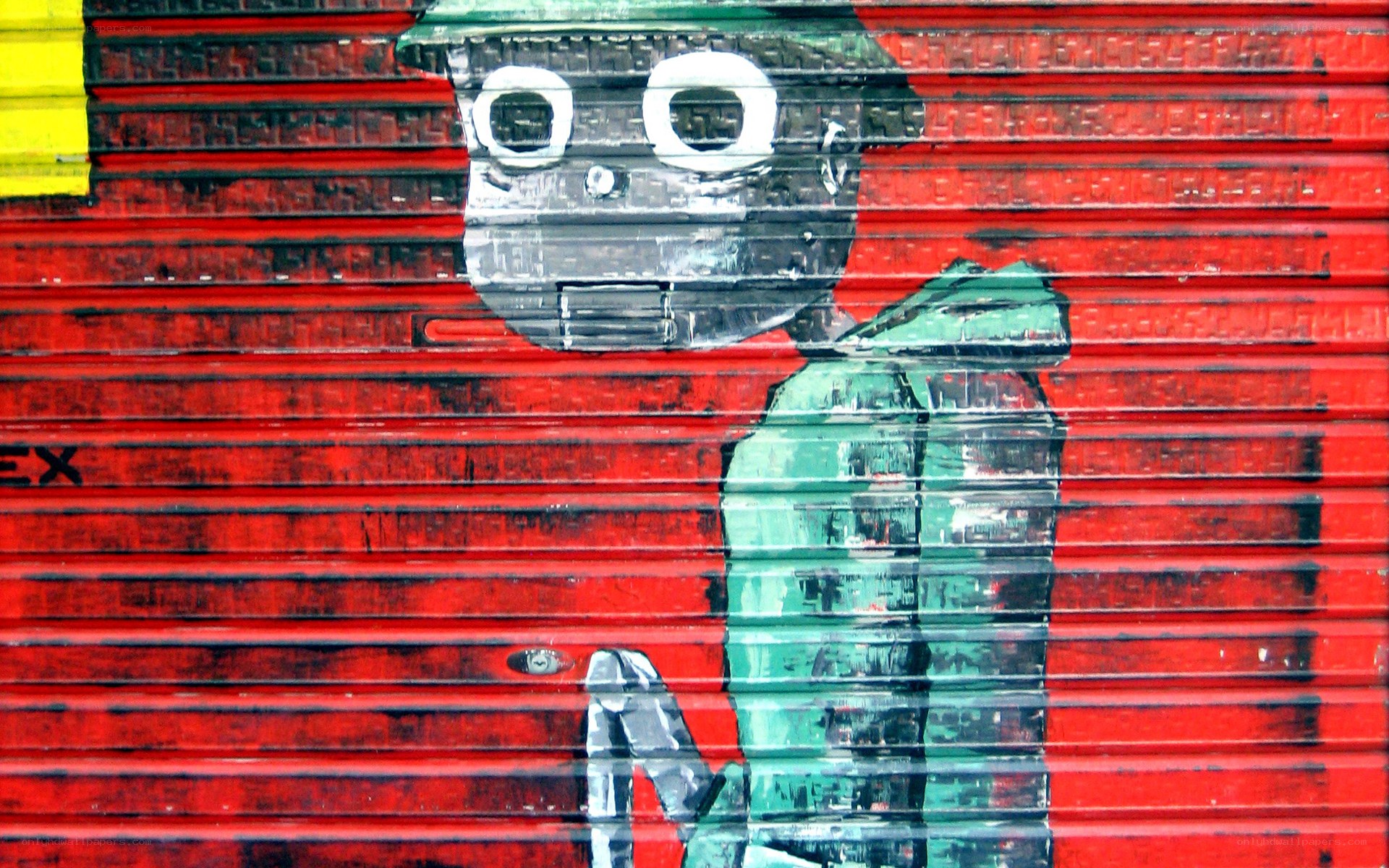 robot graffiti on red shutter