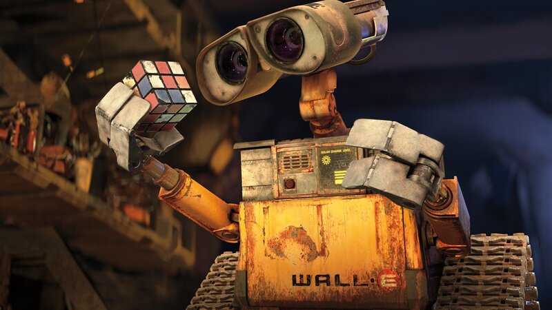 Robot Holding Cube — Yellow, Curious