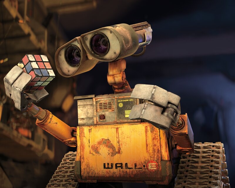 Robot Holding Cube — Yellow