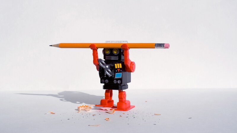 Robot Holding Pencil