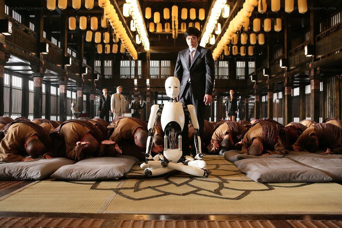Robot in a temple with monks