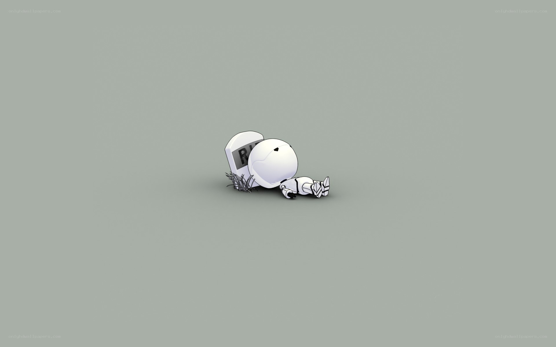 Robot lying next to a tombstone